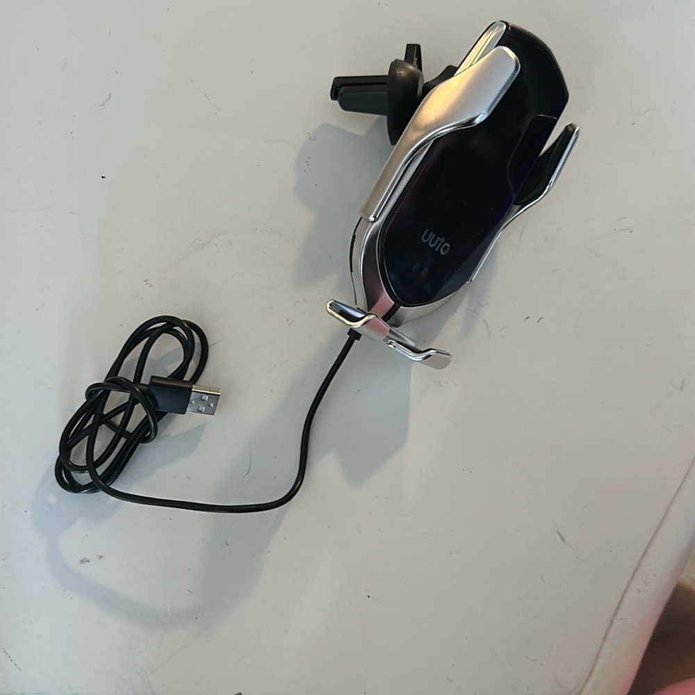 Phone charger and holder for car vents